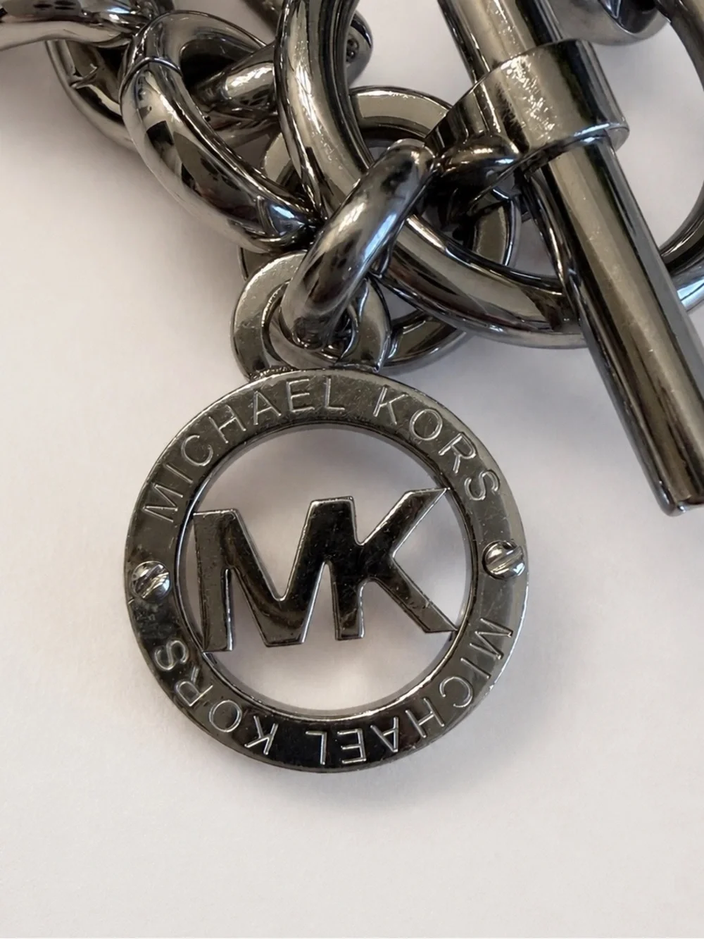 Michael Kors Silver Tone Chunky Chain Toggle MK Logo Charm Bracelet